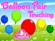 Jouer à Balloon pair touching